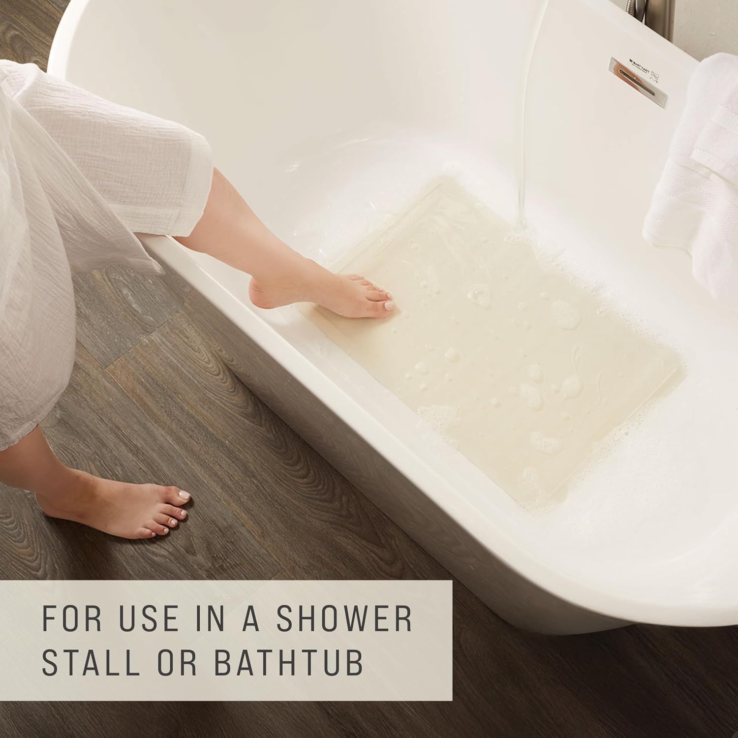 image:imageRubbermaid Commercial Products SaftiGrip Bath Mat Medium White SuctionBacked NonSlip for CommercialResidential Use for Shower StallBathtubBathroomLarge